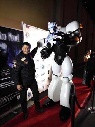 Pascal Lee, co-producer of the documentary feature "Passage to Mars" and a NASA planetary scientist, with Maxx the giant robot at the Raw Science Film Festival.