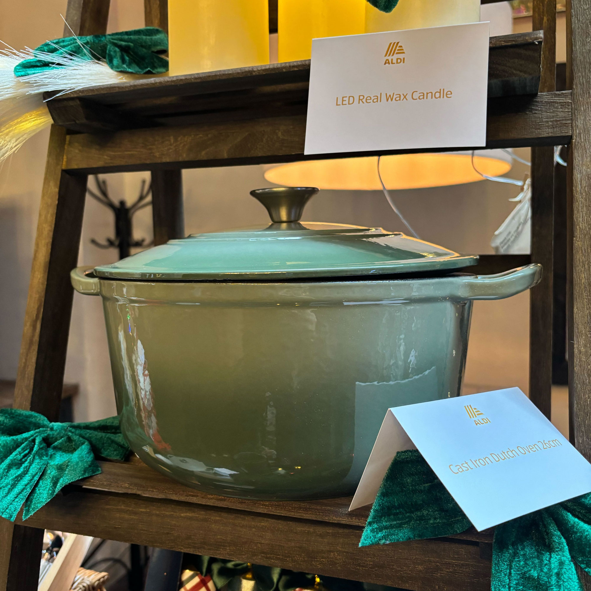 Aldi green cast iron pot on wooden ladder