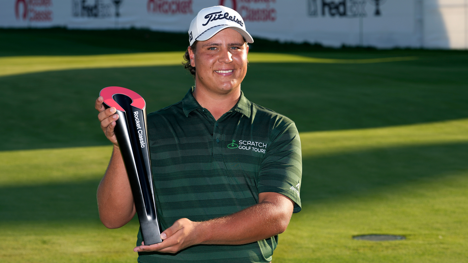 Aldrich Potgieter holds the Rocket Classic trophy
