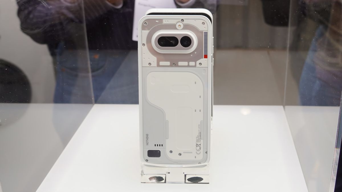 The Nothing Phone 4a on display at MWC 2026 in Black, White, Blue, and Pink colorways.