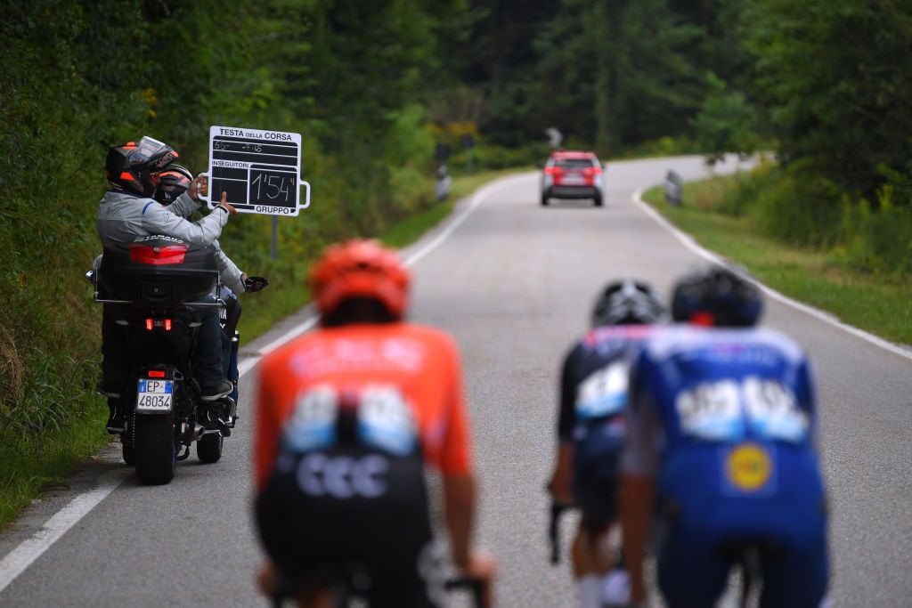 BAROLO ITALY AUGUST 12 Joey Rosskopf of The United States and CCC Team Philipp Walsleben of Belgium and Team AlpecinFenix Mikkel Frolich Honore of Denmark and Team Deceuninck QuickStep Ardoisier Motor Bike Breakaway during the 104th Giro del Piemonte 2020 a 187km race from Santo Stefano Belbo to Barolo 294m GranPiemonte GranPiemonte on August 12 2020 Barolo Italy Photo by Tim de WaeleGetty Images