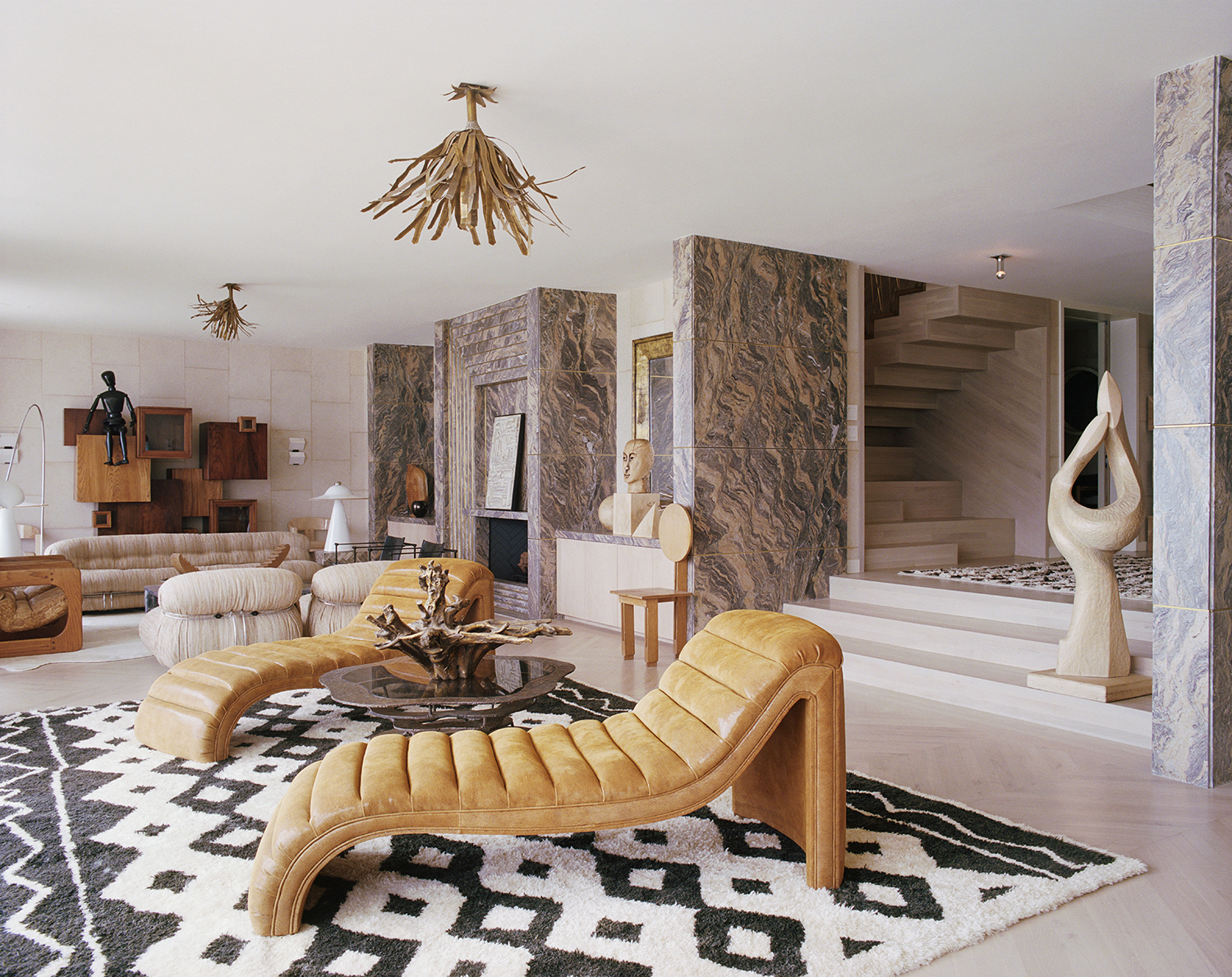 Beige living room with yellow furniture and black accents