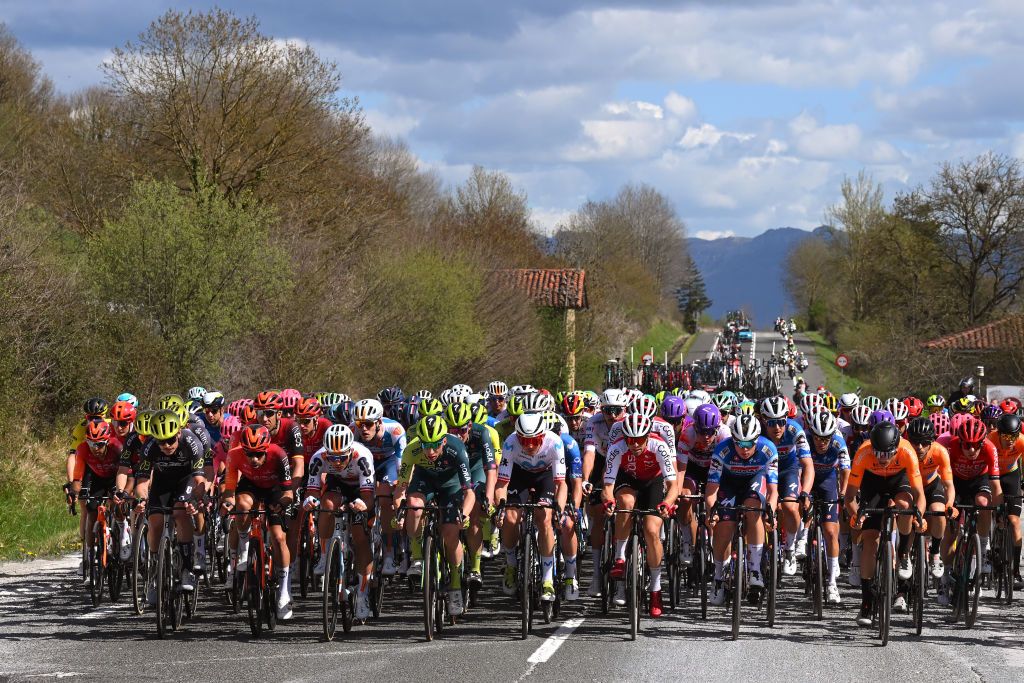 ALTSASU SPAIN APRIL 03 LR Xabier Mikel Azparren of Spain and Q365 Pro Cycling Team Jonathan Castroviejo of Spain and Team INEOS Grenadiers Emils Liepins of Latvia and Team dsmfirmenich PostNL Roger Adria of Spain and Team BORA hansgrohe Gregor Muhlberger of Austria and Movistar Team Jonathan Lastra of Spain and Team Cofidis Gil Gelders of Belgium and Team Soudal QuickStep and Laurens Huys of Belgium and Team Arkea BB Hotels lead the peloton during the 63rd Itzulia Basque Country 2024 Stage 3 a 1909km stage from Ezpeleta to Altsasu 526m UCIWT on April 03 2024 in Altsasu Spain Photo by Tim de WaeleGetty Images