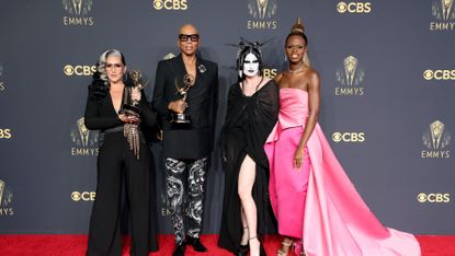 Michelle Visage, RuPaul, Gottmik, and Symone, winners of the Outstanding Competition Program award for 'RuPaul's Drag Race,' pose in the press room during the 73rd Primetime Emmy Awards at L.A. LIVE on September 19, 2021 in Los Angeles, California.