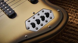 The pickup slide switches on the Squier Limited Edition Classic Vibe Bass VI