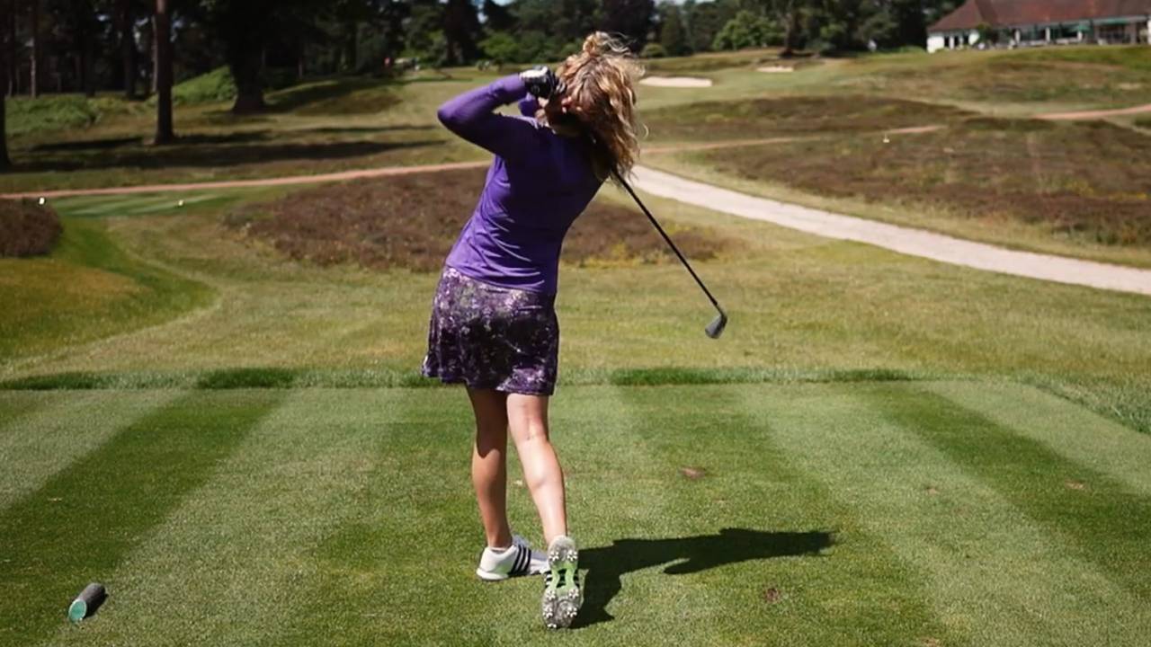 Katie Dawkins driving wearing spiked shoes