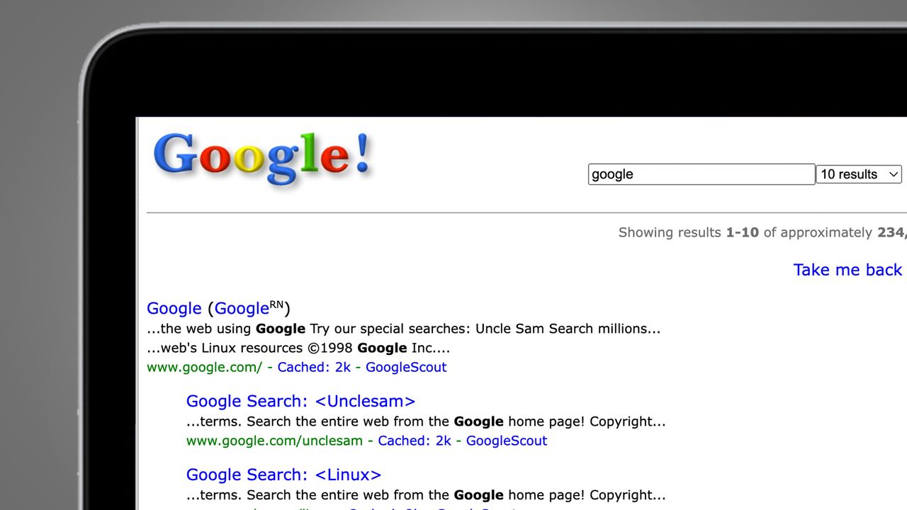 A laptop screen on a grey background showing a Google easter egg