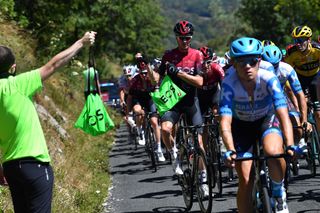 CEYZERIAT FRANCE AUGUST 07 Christopher Froome of The United Kingdom and Team INEOS Feed Zone Soigneur Peloton during the 32nd Tour de LAin 2020 Stage 1 a 140km stage from MontralLaCluse to Ceyzriat 304m tourdelain TOURDELAIN TDA on August 07 2020 in Ceyzeriat France Photo by Justin SetterfieldGetty Images