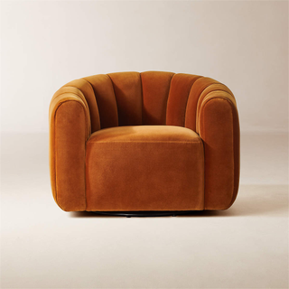 rust-colored swivel accent chair