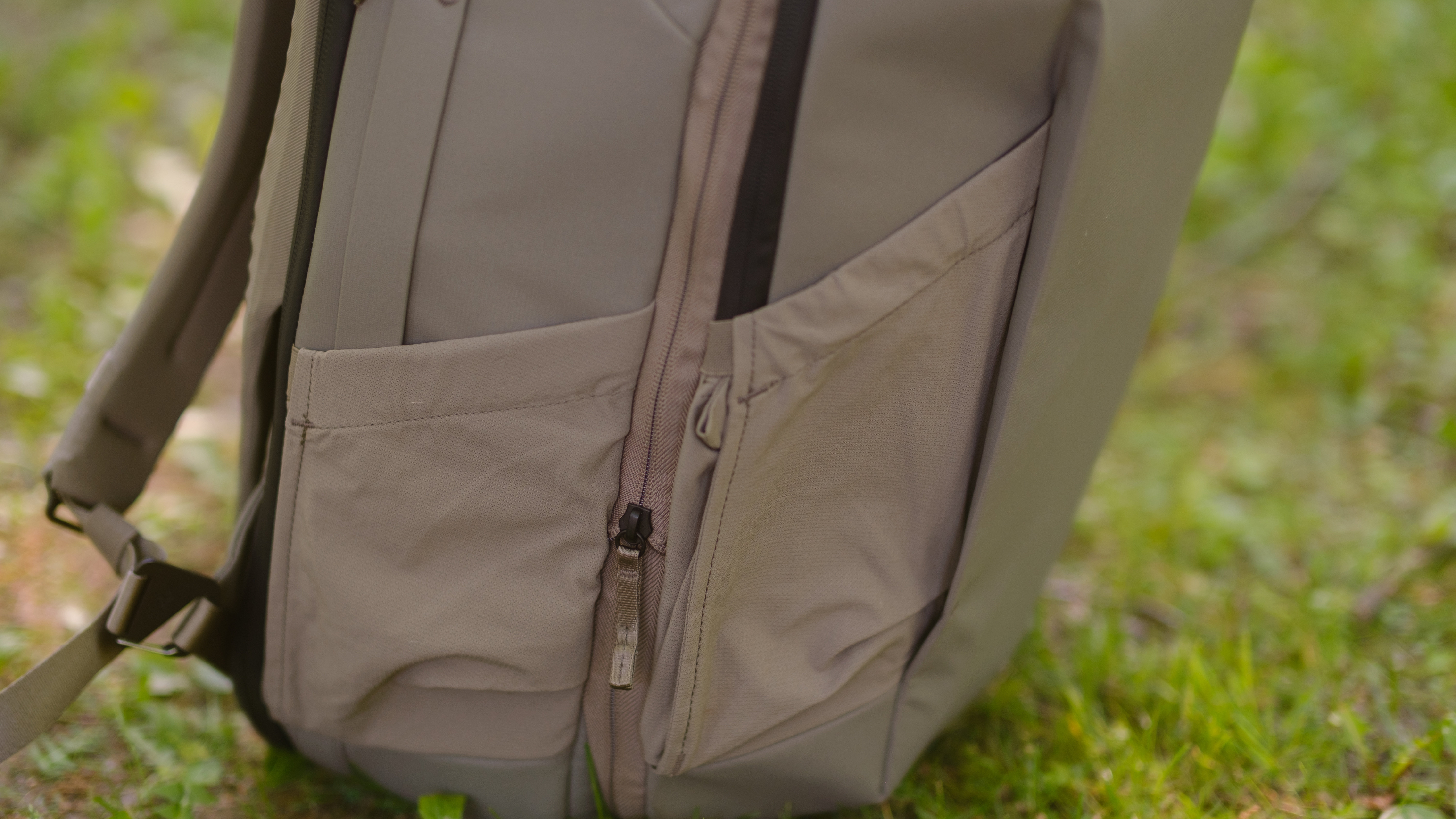 The Peak Design Travel 2-in-1 Backpack outdoors used by a photographer