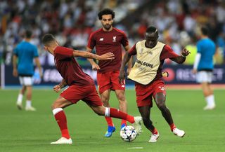 Liverpool’s front three of Roberto Firmino (left), Mohamed Salah and Sadio Mane have scored almost 250 goals for the club between them
