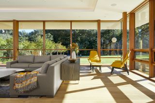 Happy Valley House family room with yellow chairs