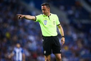 Referee Artur Soares Dias gestures during the Semi-Final Second Leg - Portuguese Cup match between FC Porto and Vitoria Guimaraes at Estadio do Dragao on April 17, 2024 in Porto, Portugal. (Photo by Diogo Cardoso/Getty Images)