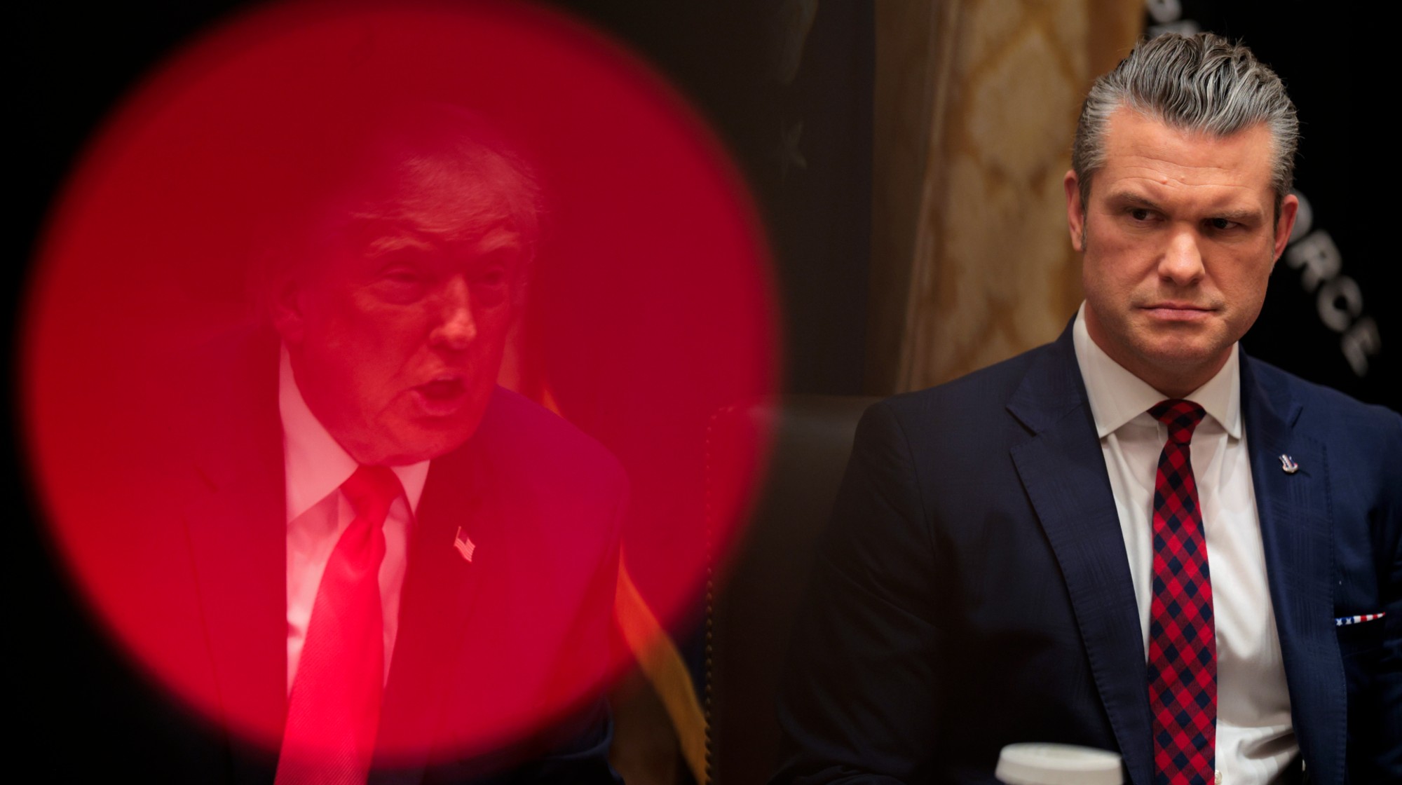 President Donald Trump (L) speaks as Secretary of War Pete Hegseth looks on during a meeting of his Cabinet in the Cabinet Room of the White House on December 02, 2025 in Washington, DC. A bipartisan Congressional investigation has begun regarding Secretary of War Pete Hegseth's role in ordering U.S. military strikes on small boats in the waters off Venezuela that have killed scores of people, which Hegseth said are intended "to stop lethal drugs, destroy narco-boats and kill the narco-terrorists who are poisoning the American people.&rdquo;