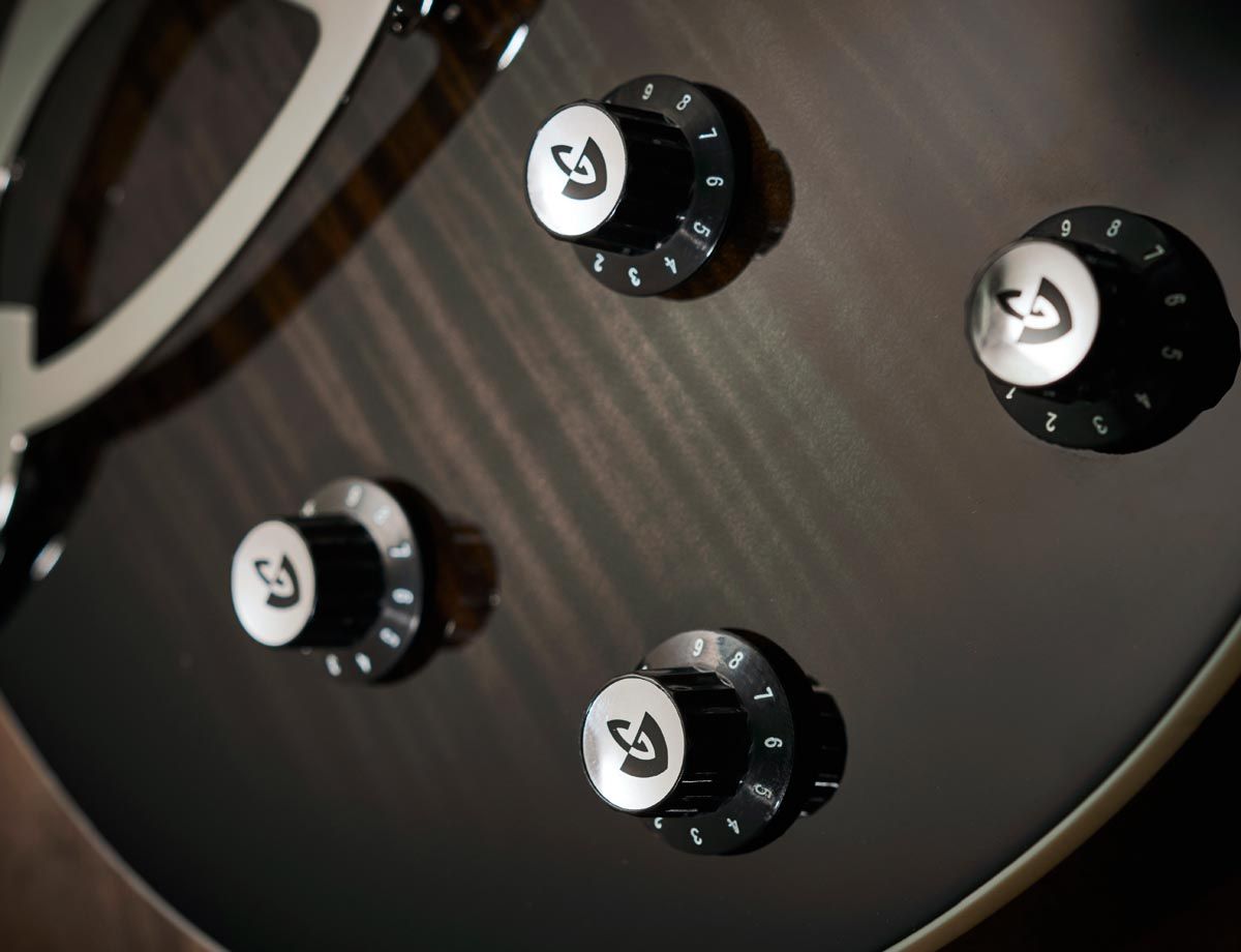 The Guild reflector knobs are pretty cool. Both guitars offer a similar setup with independent volume and tone controls for both pickups &ndash; but the HH [pictured] has coil-splits on the volume controls.