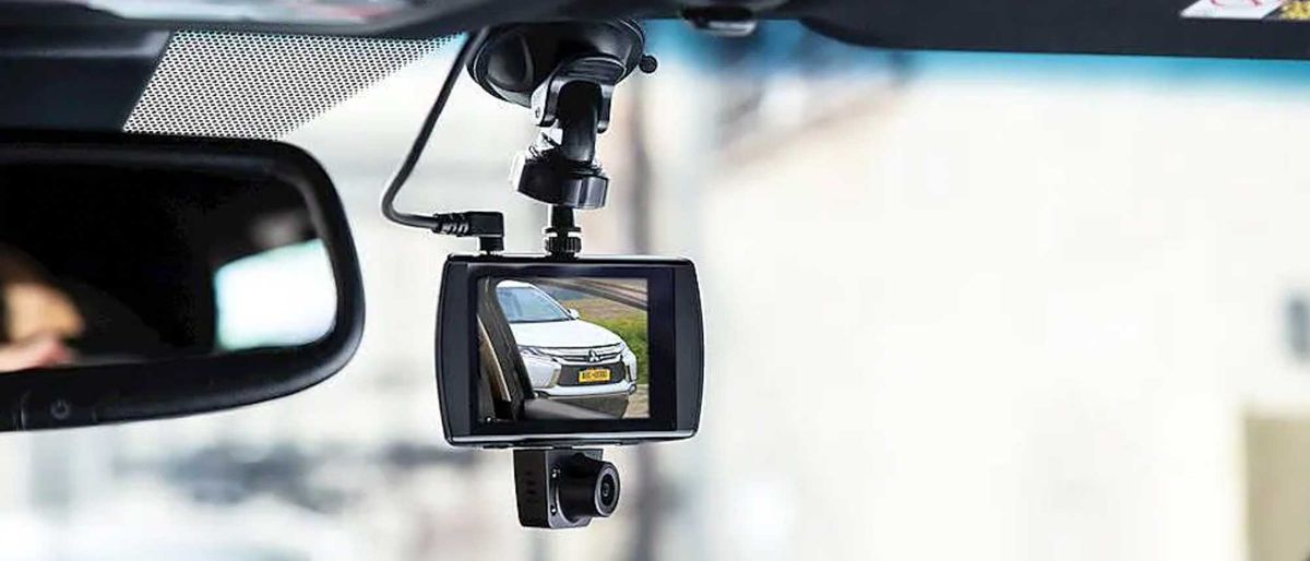 Car &amp; Driver Road Patrol Touch Duo dash cam mounted in car