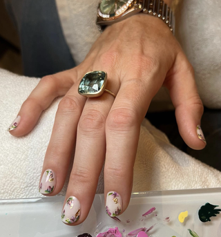 a close up of the micro floral manicure on blake lively