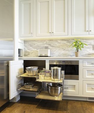 Slide out storage in kitchen cabinets