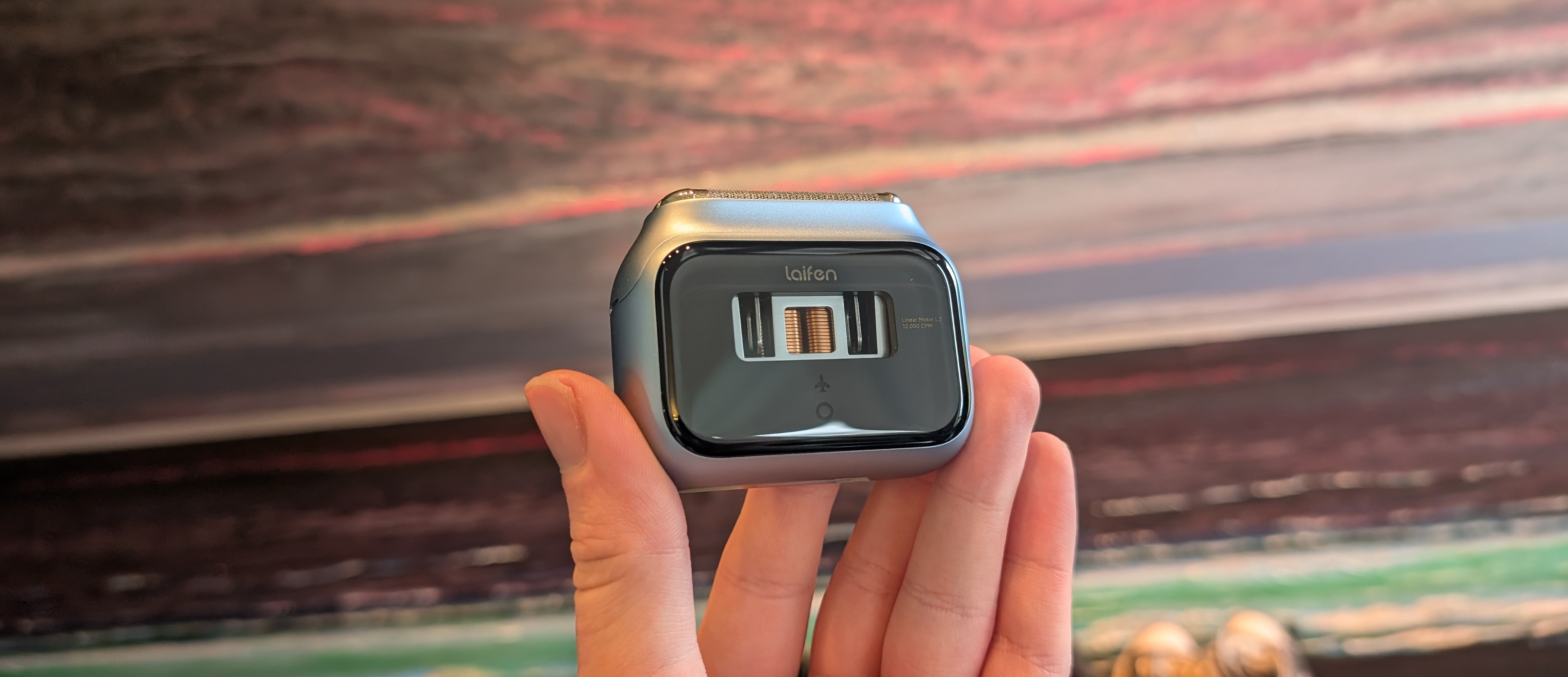 The Laifen P3 Pro electric travel shaver being held in the reviewer's hand.