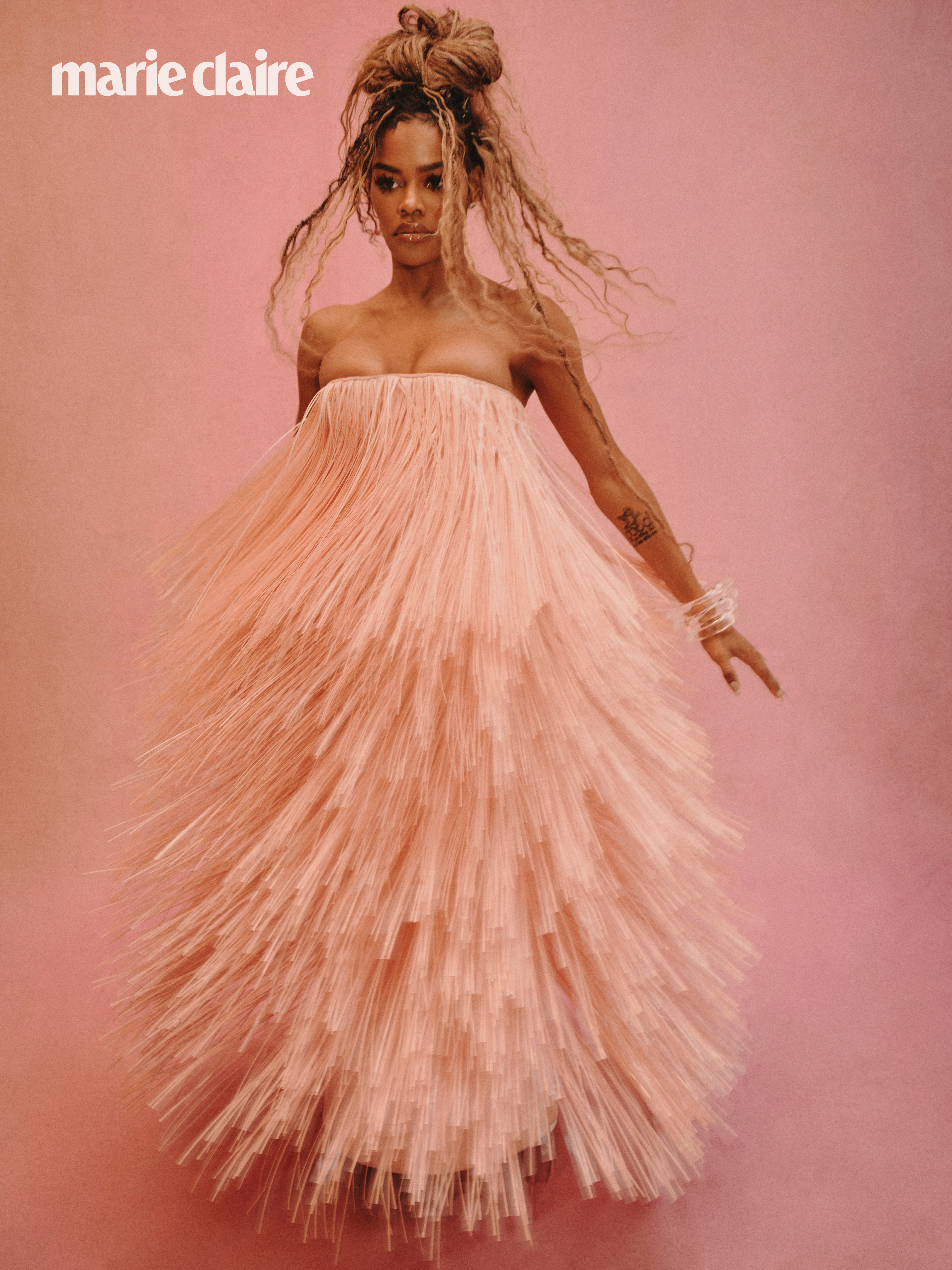 Teyana Taylor wearing a pink flouncy dress