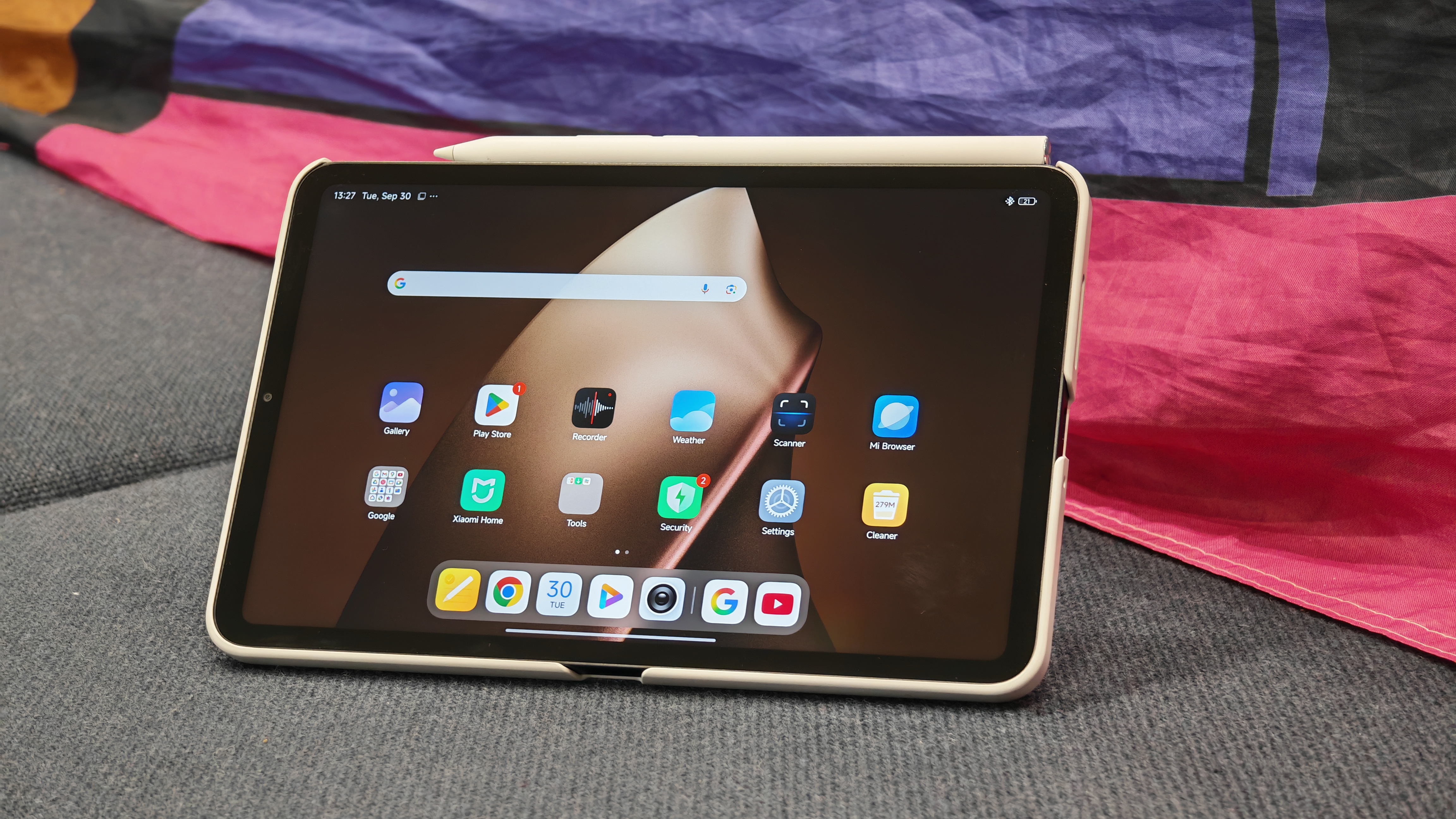 Xiaomi Pad Mini on a sofa