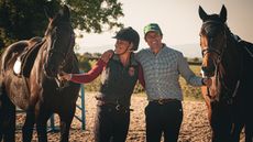 brooke-and-andrew-with-horses-on-ground.jpg