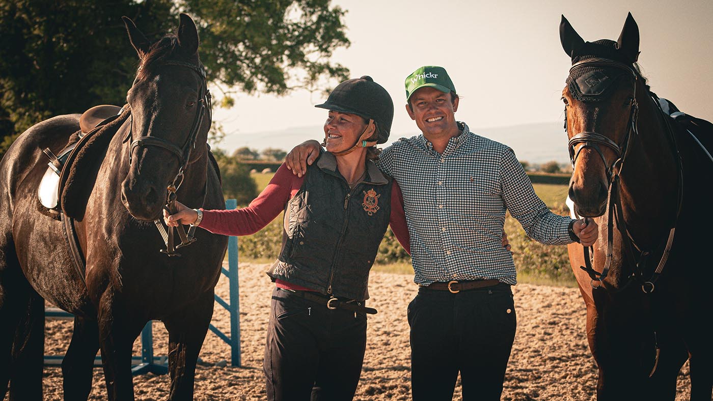 brooke-and-andrew-with-horses-on-ground.jpg