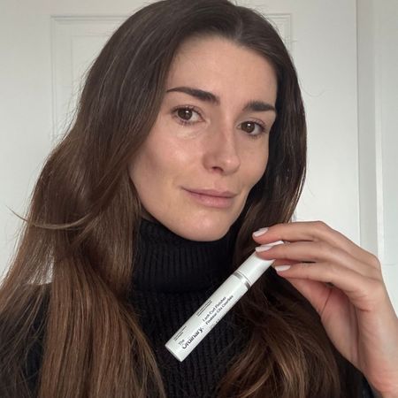 beauty editor Eleanor Vousden holding The Ordinary Lash Curl Finisher