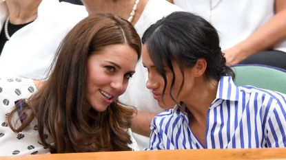 london, england july 14 catherine, duchess of cambridge and meghan, duchess of sussex attend day twelve of the wimbledon tennis championships at the all england lawn tennis and croquet club on july 14, 2018 in london, england photo by karwai tangwireimage