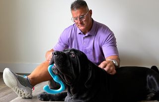 Former NFL star Jeff Zgonina and his pet dog, a Neapolitan mastiff called Hank