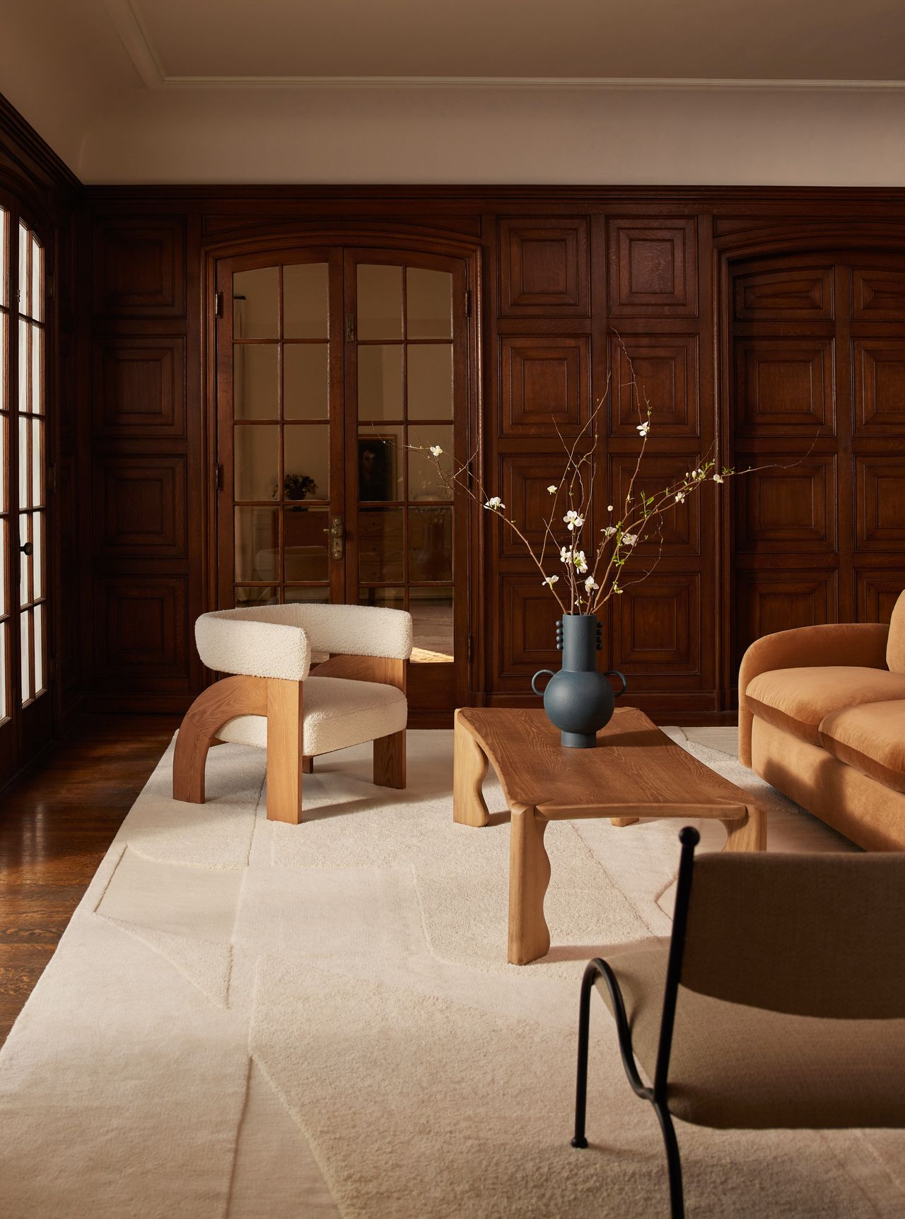 Aimee Song's new Lulu and Georgia collection photographed in a wood-paneled living room