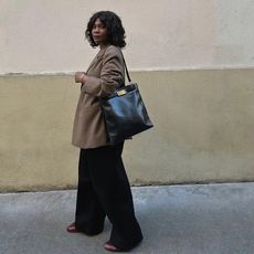 woman wearing tote bag