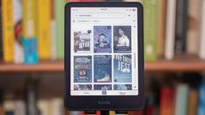 Amazon Kindle Colorsoft Signature edition e-reader showing graphic novels, cookbooks, and fiction, as well as settings