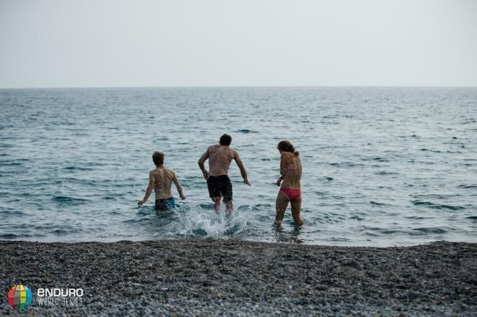 Riders head into the sea to cool down