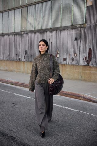 sweater, pants, and shoulder bag outfit