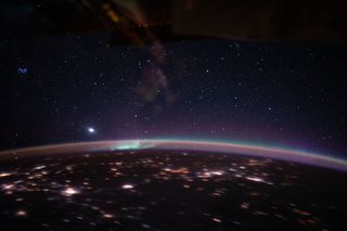 Green auroras clash with orange airglow in this stunning view of Earth from the International Space Station. An Expedition 62 crewmember captured this photo from 263 miles (423 kilometers) above the Earth as the space station passed over Kazakhstan on March 17, 2020.
