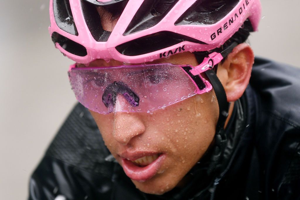 CORTINA DAMPEZZO ITALY MAY 24 Egan Arley Bernal Gomez of Colombia and Team INEOS Grenadiers Pink Leader Jersey during the 104th Giro dItalia 2021 Stage 16 a 153km stage shortened due to bad weather conditions from Sacile to Cortina dAmpezzo 1210m Rain Oakley glasses girodiitalia Giro on May 24 2021 in Cortina dAmpezzo Italy Photo by Tim de WaeleGetty Images