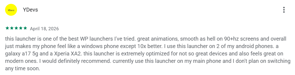 User review from YDevs, rated five stars, dated April 18, 2026. Praises the WP launcher for great animations and performance on various devices.