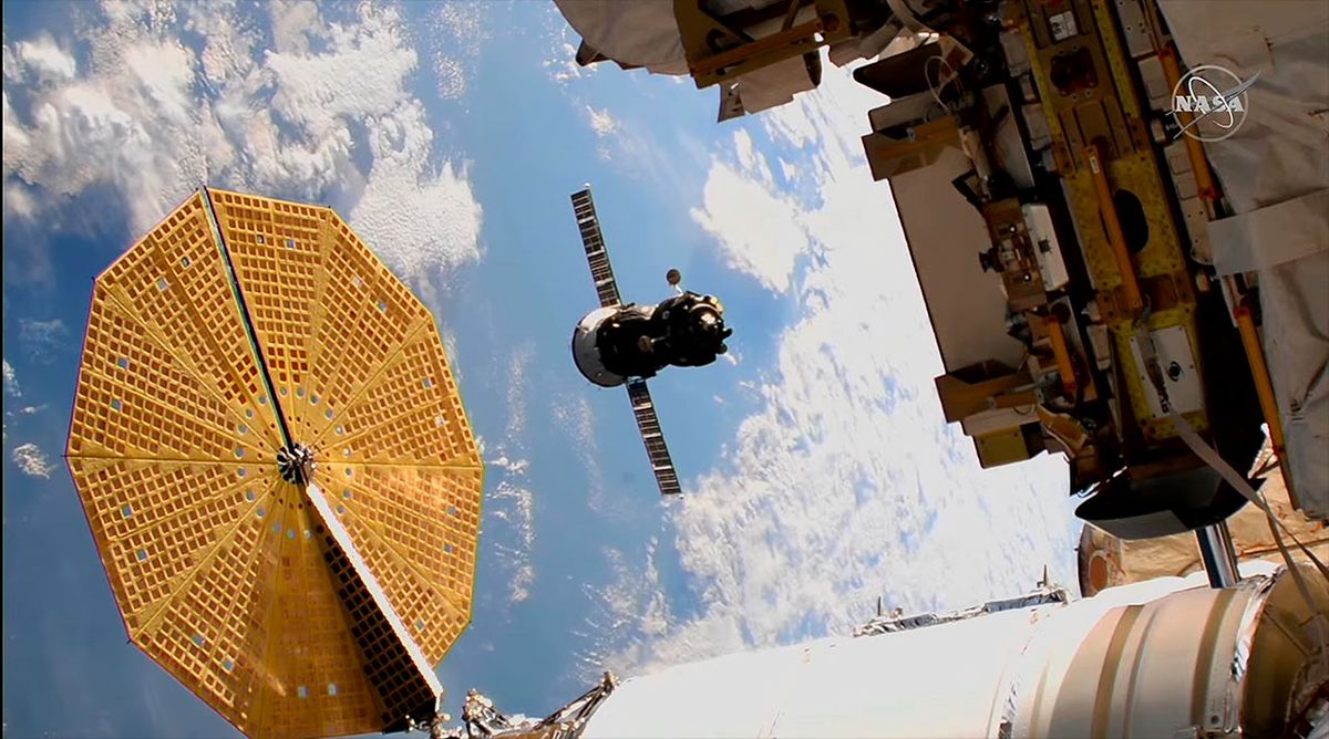 Space station personnel move Soyuz spacecraft to new parking lot before new arrivals