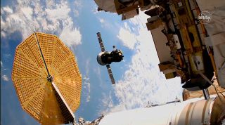 Russia's Soyuz MS-17 spacecraft with Expedition 54 commander Sergey Ryzhikov and flight engineer Sergey Kud-Sverchkov, both of the Russian state space corporation Roscosmos, and flight engineer Kate Rubins of NASA, on board is seen from a camera outside of the International Space Station as it is relocated from the Rassvet to Poisk module on Friday, March 19, 2021.
