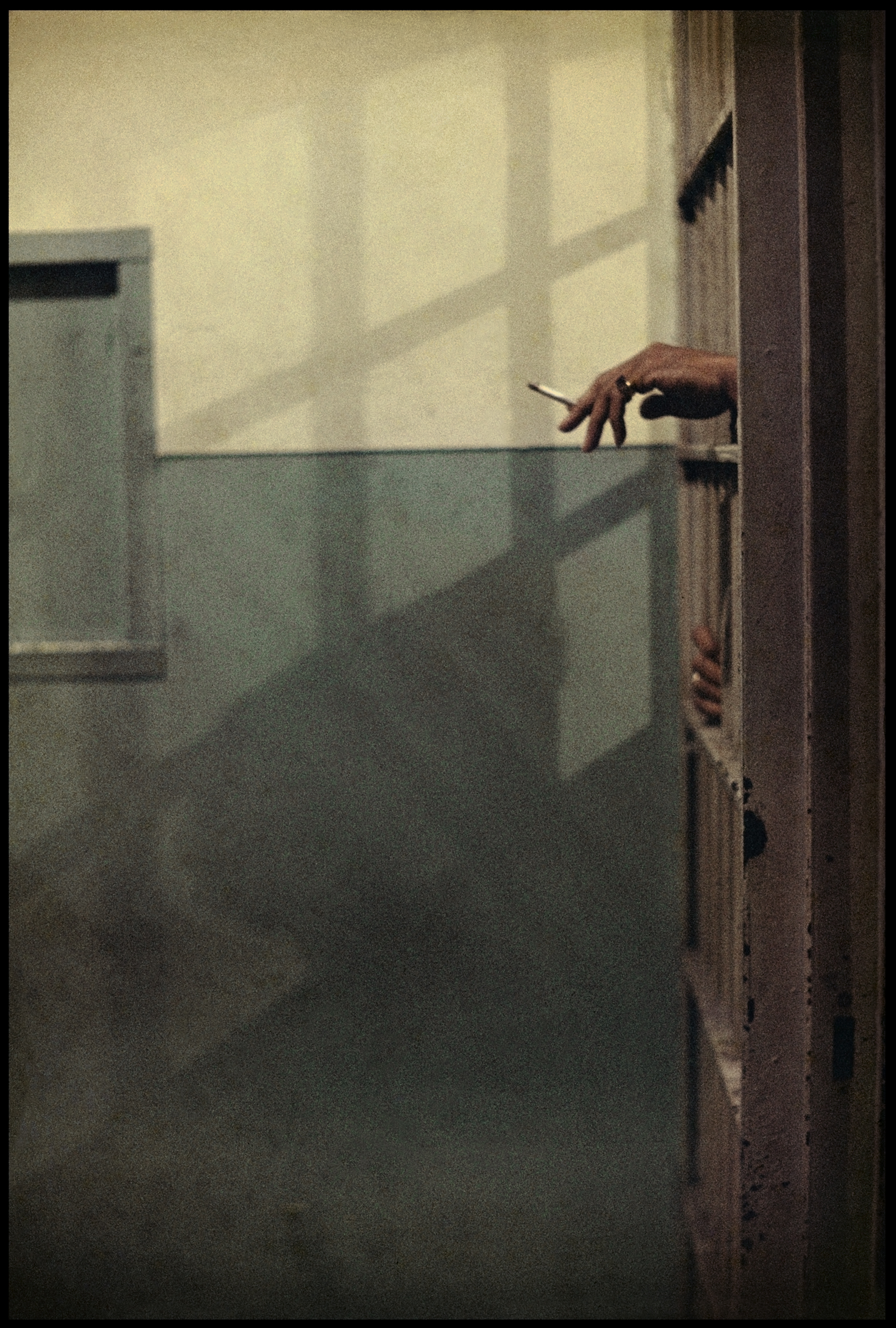 hand holding cigarette