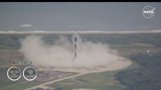 A SpaceX black and white rocket launches the Crew-9 astronaut mission for NASA.