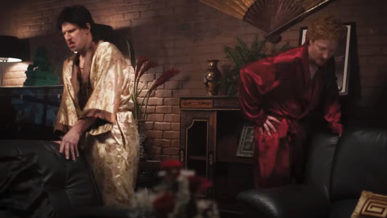Andy Samberg as Jose Canseco and Akiva Schaffer as Mark McGwire humping furniture in The Unauthorized Bash Brothers Experience
