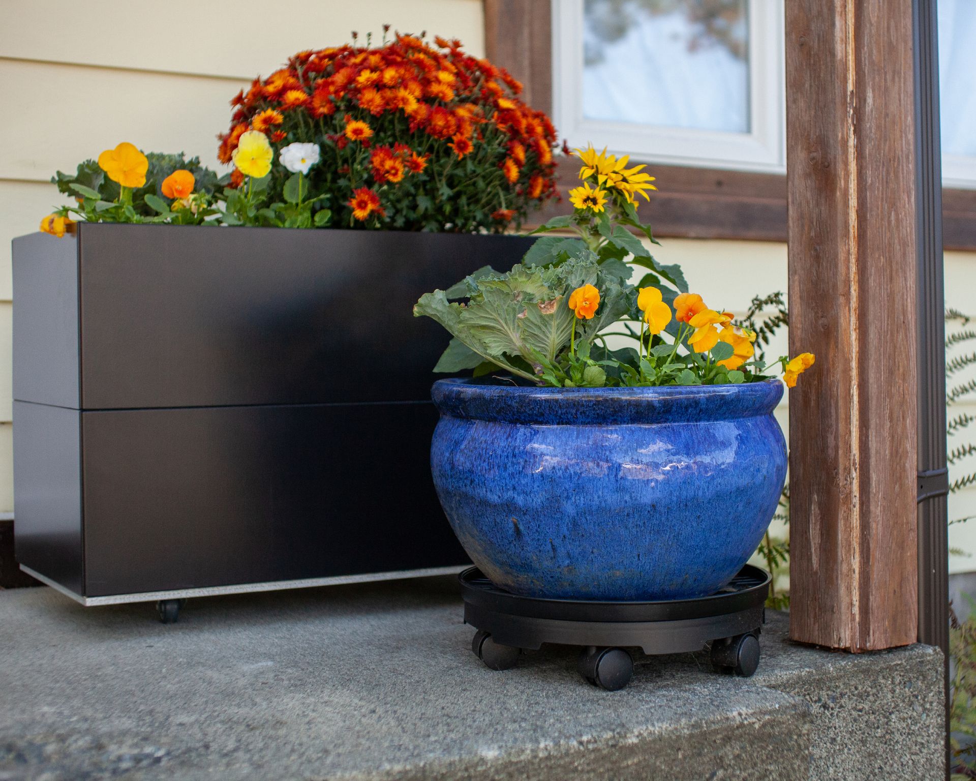 pot and planter on wheels on porch