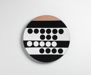 Black and white patterned enamelled copper tondo