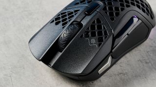 Photograph of the SteelSeries Aerox 5 wireless gaming mouse with honeycomb design