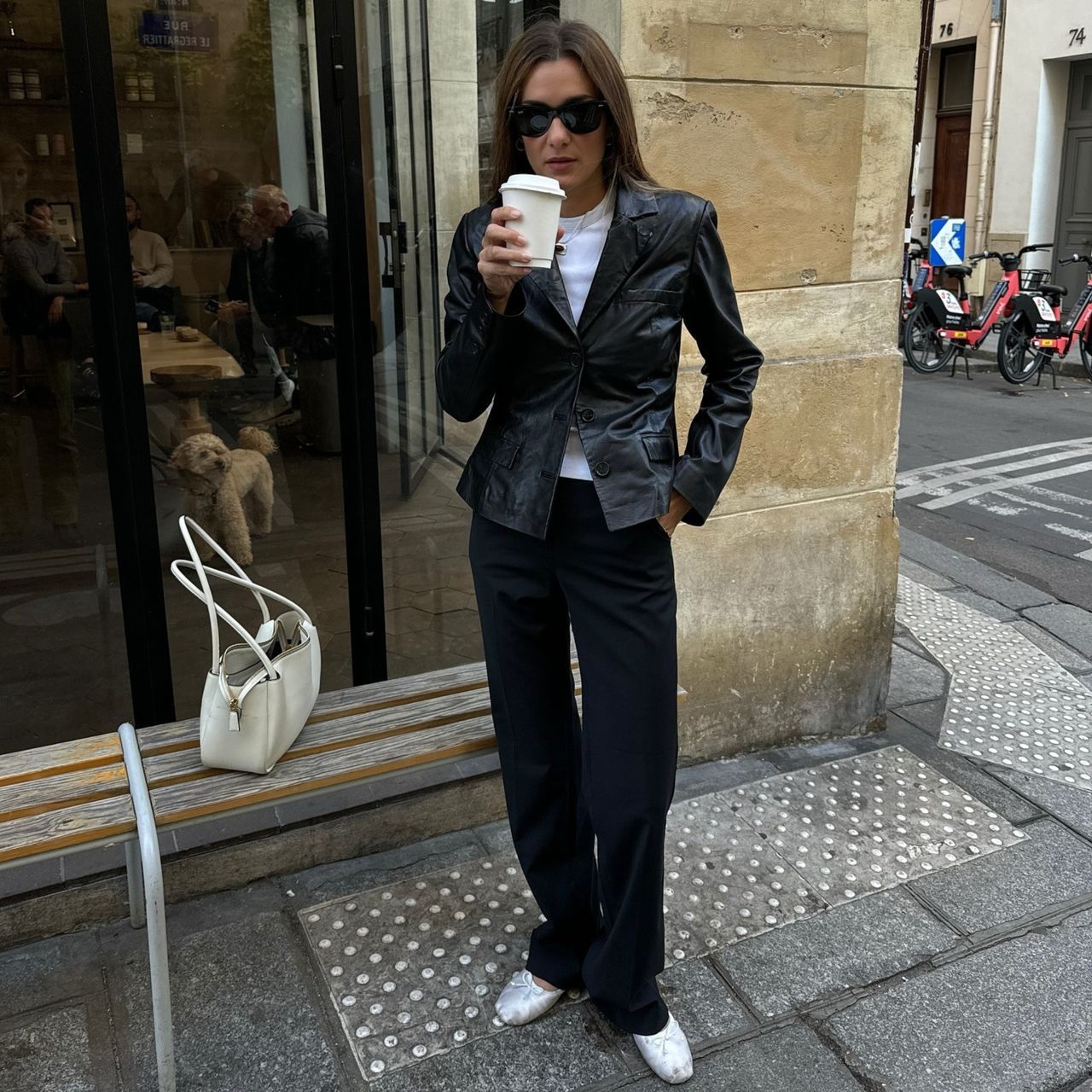 @annelauremais wearing a black trousers outfit.