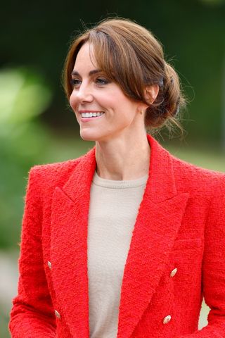 Kate Middleton pictured with a low, pinned up bun on September 27, 2023 in Sittingbourne, England.