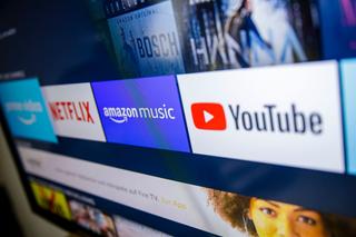 The logos of the streaming services Amazon Prime Video, Netflix, amazon music and youtube can be seen on a television (Photo by Thomas Trutschel/Photothek via Getty Images)
