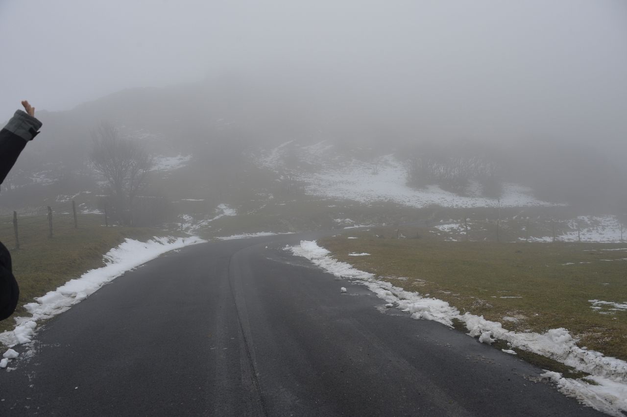 Snow on the side of the road